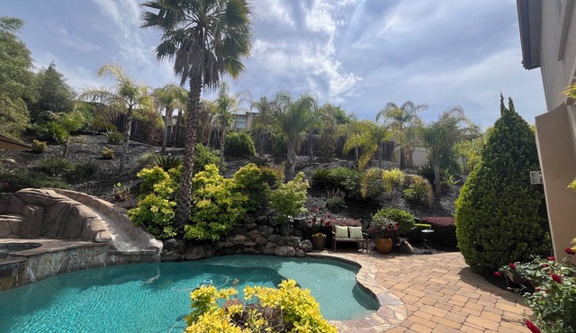 Resort style 4 bedroom home in Hillcrest gated community with pool and spa