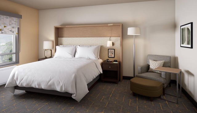 Restful Room with Plush Beds and Free Hot Breakfast for a Relaxing Stay