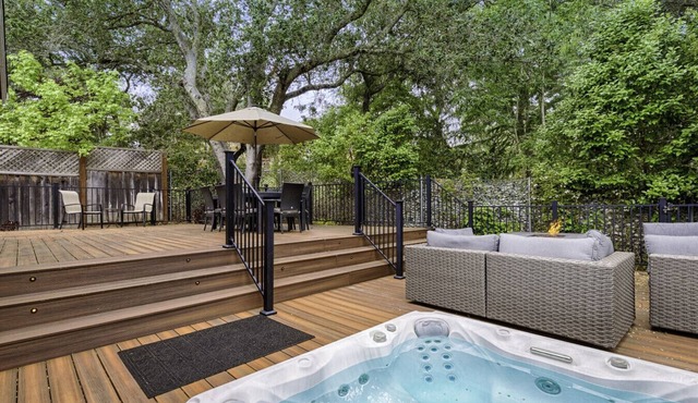 Spacious 4BD 3BA with hot tub, fire pit, and wraparound deck