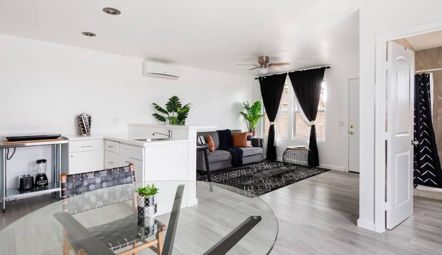 Striking Black & White Apt w Gated Entrance & Yard