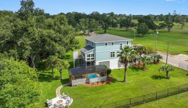 Stunning Custom Home. Walk to the Beach. Heated POOL! Elevator!