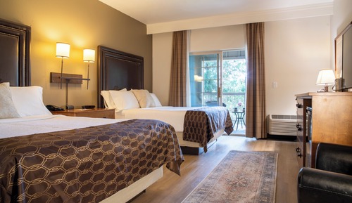 Golf View room with 2 Queen beds and a deck