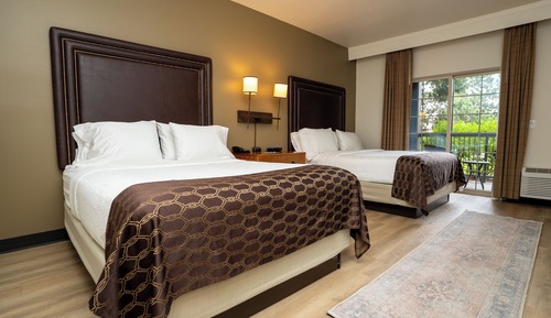 Village View room with 2 Queen beds and a deck