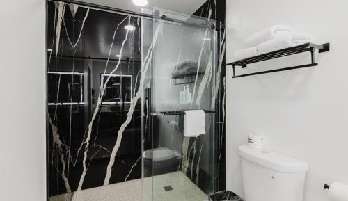 King Room with Two King Beds and Shower - Non-Smoking