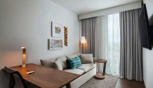 One-Bedroom King Suite with Sofa Bed and City View
