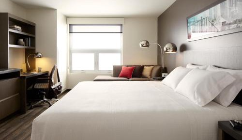 King Room (Den) with Roll-In Shower and Sofa Bed - Mobility Access