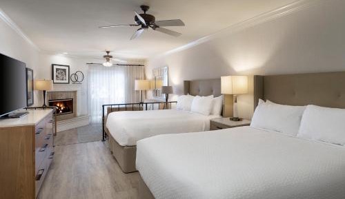 Queen Suite with Two Queen Beds and Partial Ocean View