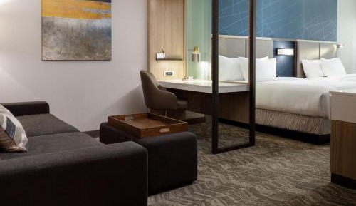 Queen Suite with Two Queen Beds, Roll-In Shower and Trundle Sofa - Mobility Access
